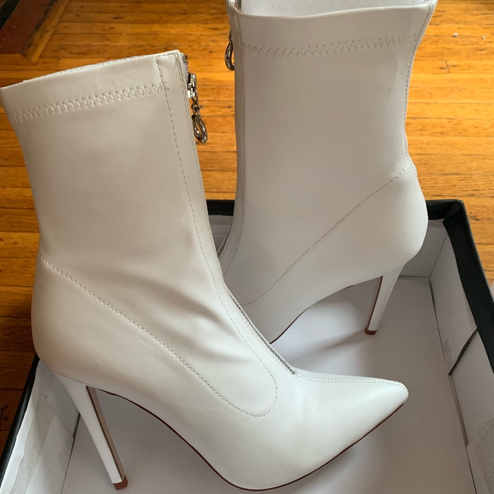 White leather pumps